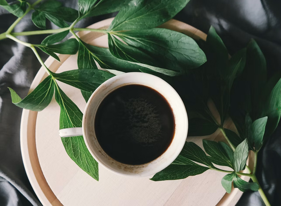 A cup of black coffee seen from above